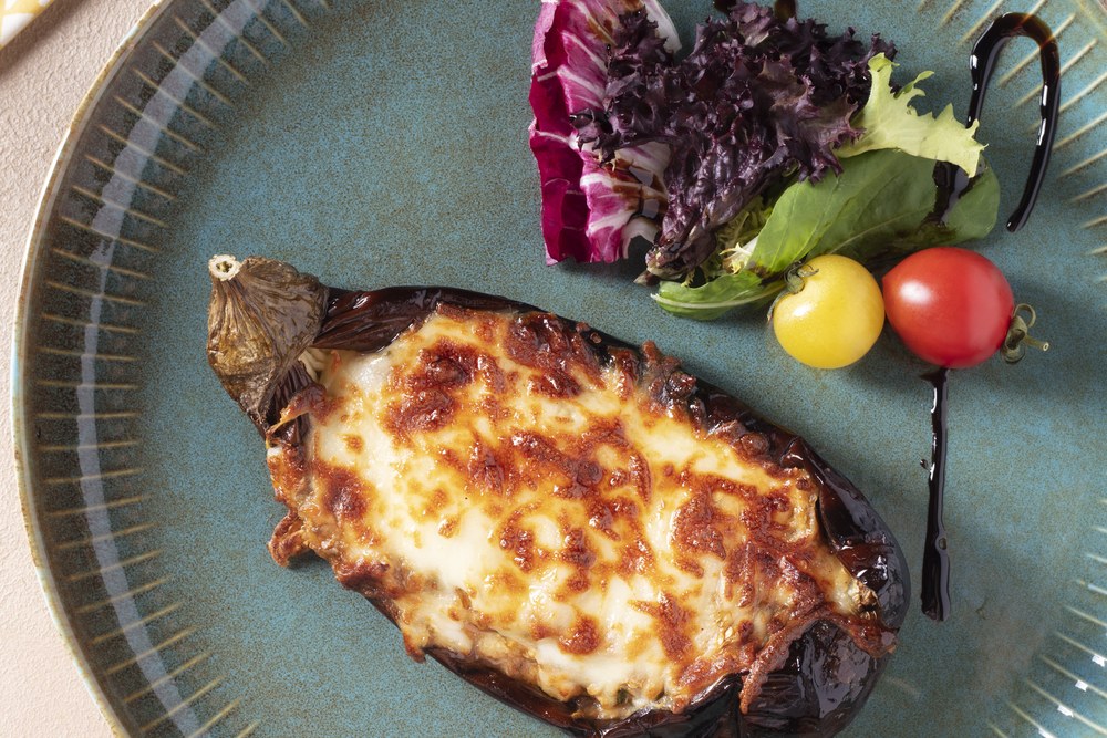 Deraliye Terrace - roasted eggplant filled with cheese and baked until golden
